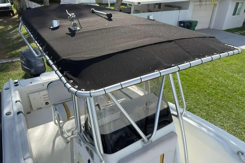 Slide: The Image of 2003 Hydra-Sports Vector 2400 CC boat with black T-top and seating. - 37