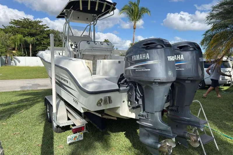 Slide: The Image of 2003 Hydra-Sports Vector 2400 CC boat with twin Yamaha 150 engines on a trailer. - 5