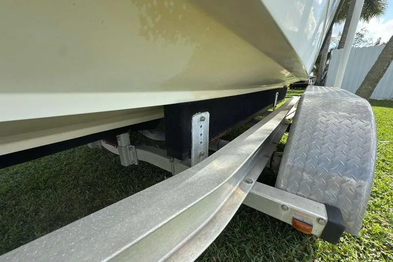 Slide: The Image of Trailer for 2003 Hydra-Sports Vector 2400 CC boat on grass. - 52