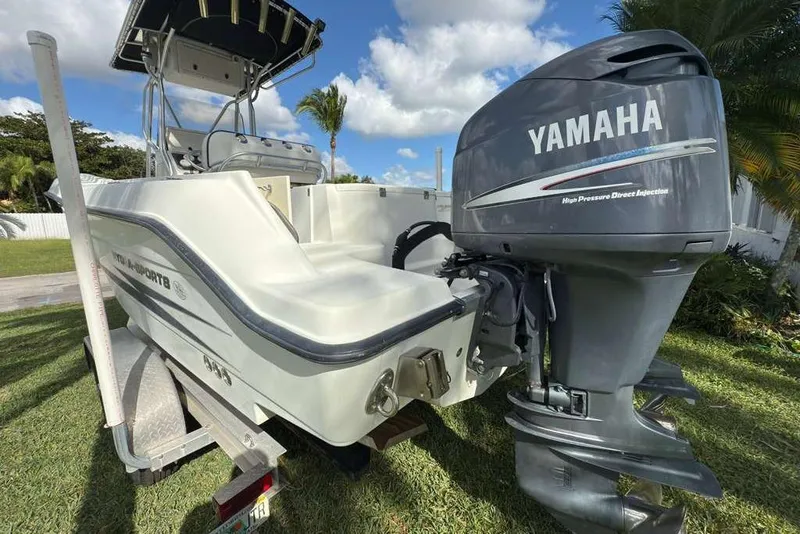 Slide: The Image of 2003 Hydra-Sports Vector 2400 CC boat with Yamaha outboard motor on trailer. - 55
