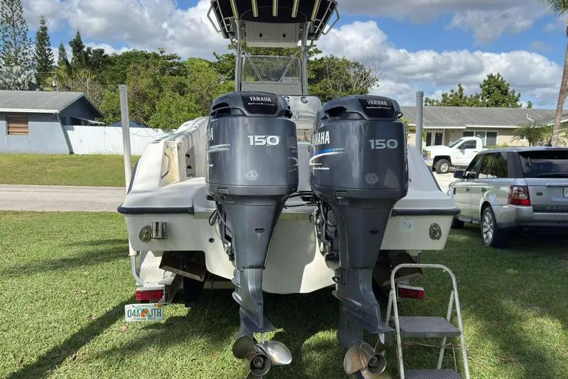 Slide: The Image of 2003 Hydra-Sports Vector 2400 CC with twin Yamaha 150 engines on grass. - 6