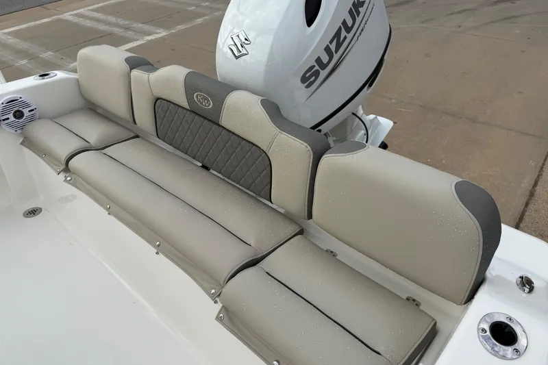 Slide: The Image of 2026 Key West 189 FS boat with Suzuki engine, featuring cushioned seating. - 14