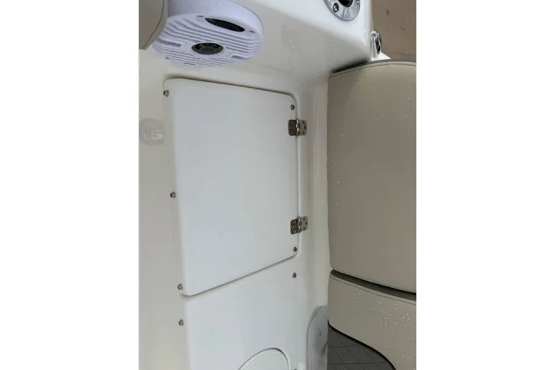 Slide: The Image of 2026 Key West 189 FS boat interior with speaker and storage compartment. - 24