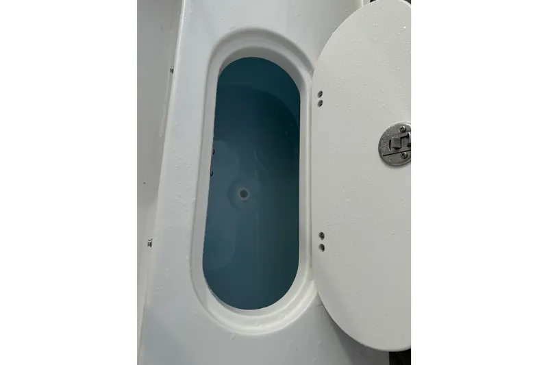 Slide: The Image of Open storage compartment on 2026 Key West 189 FS boat, showcasing interior space. - 27