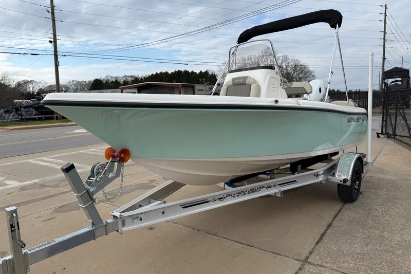Slide: The Image of 2026 Key West 189 FS boat on trailer, parked outdoors, side view. - 3