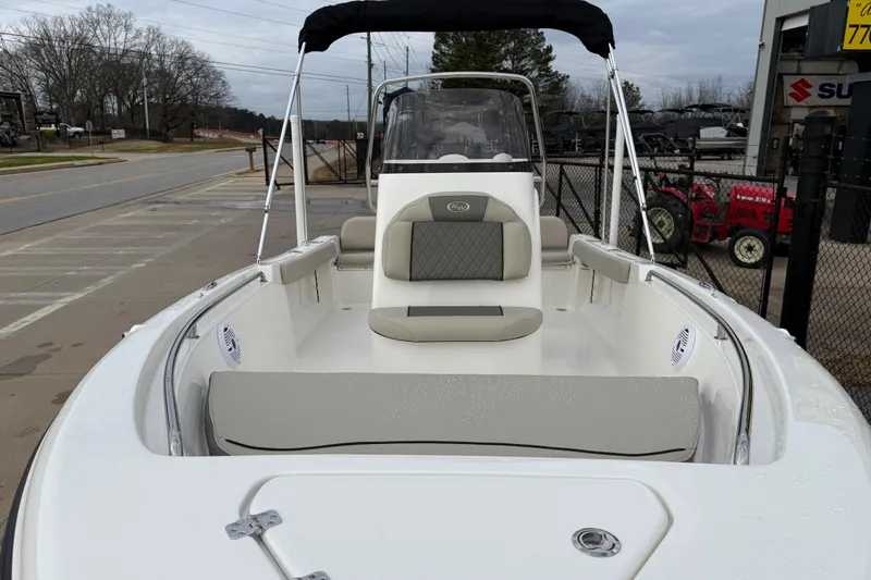 Slide: The Image of 2026 Key West 189 FS boat with seating, docked outdoors. - 8