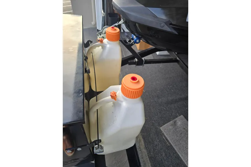 Slide: The Image of Fuel containers beside a 2016 GTX Sea-Doo Limited on a trailer. - 4