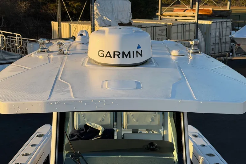 Slide: The Image of 2023 Blackfin 272 CC boat with Garmin radar on the roof. - 20