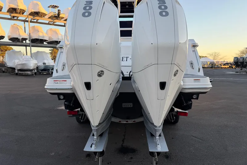 Slide: The Image of 2023 Blackfin 272 CC boat with twin 300 horsepower outboard engines. - 29