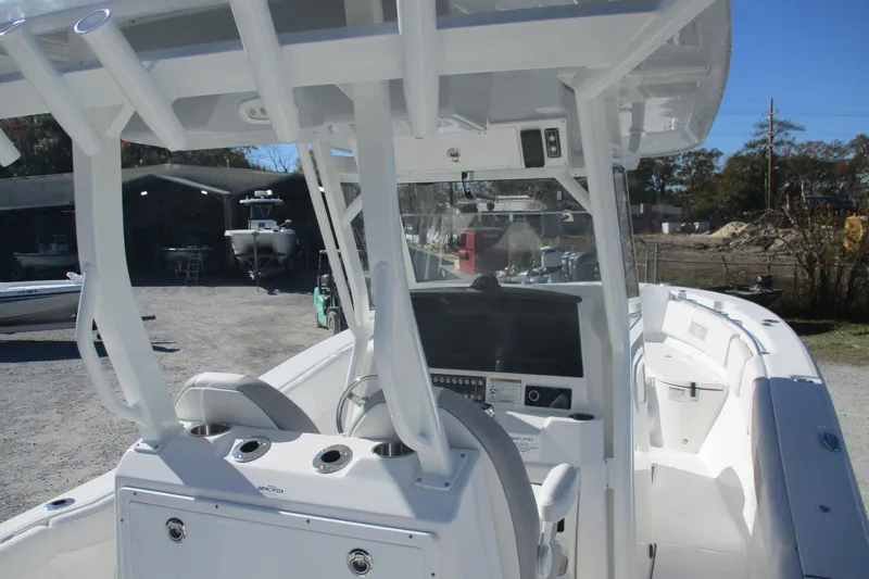 Slide: The Image of 2026 Sea Fox 288 Commander boat interior with helm and seating area. - 12