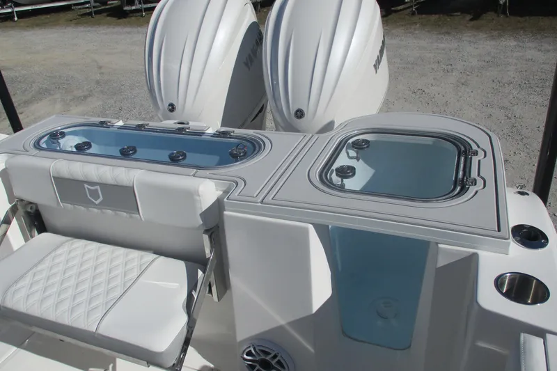 Slide: The Image of 2026 Sea Fox 288 Commander boat interior with dual Yamaha engines and seating. - 15