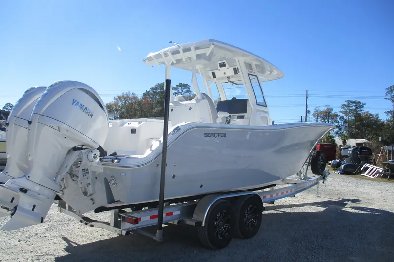 Slide: The Image of 2026 Sea Fox 288 Commander boat on trailer, featuring dual Yamaha engines. - 5