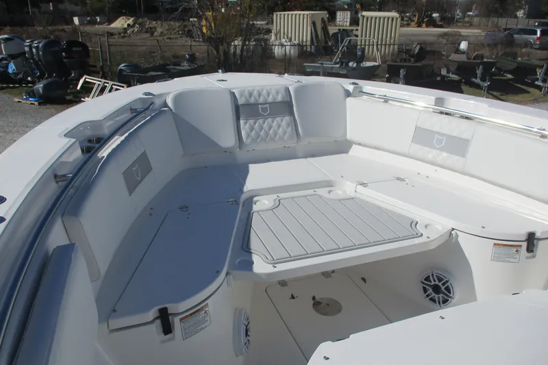 Slide: The Image of 2026 Sea Fox 288 Commander boat interior with cushioned seating and storage compartments. - 9