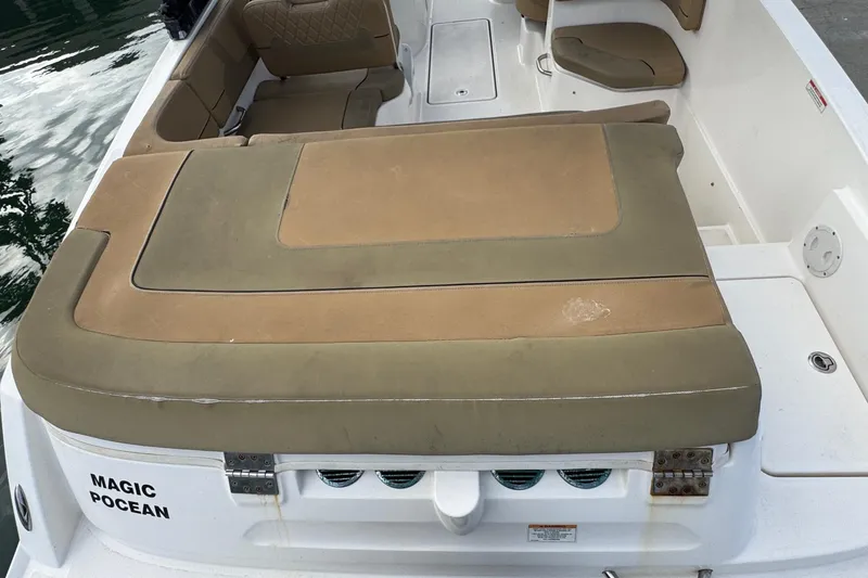 Slide: The Image of 2022 Bayliner VR6 Bowrider OB with tan seating, labeled "Magic Pocean." - 10