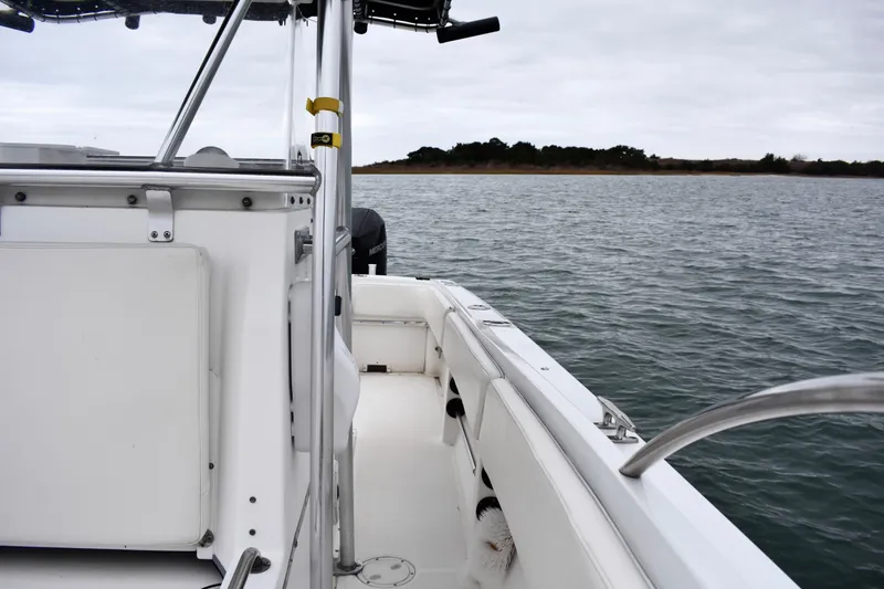 Slide: The Image of 2001 Fountain 31 Tournament Edition boat on calm waters, overcast sky. - 15