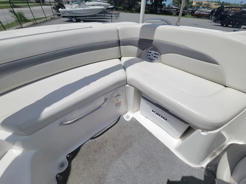 Slide: The Image of 2007 Chaparral Sunesta 214 boat interior with cushioned seating and speaker. - 19