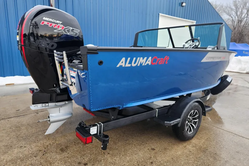 Slide: The Image of 2026 Alumacraft Competitor 175 Sport boat with Mercury Pro XS engine, parked on trailer. - 3