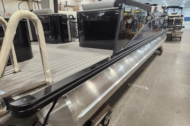 Slide: The Image of 2026 Tahoe Pontoon 25 Cascade Quad Lounge seat wrapped in protective plastic. - 13