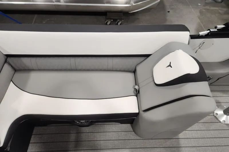 Slide: The Image of 2026 Tahoe Pontoon 25 Cascade Quad Lounge, rear view with motor and railing. - 14