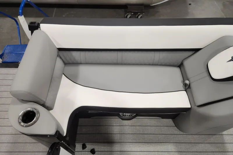 Slide: The Image of 2026 Tahoe Pontoon 25 Cascade Quad Lounge interior with blue LED lighting and cushioned seating. - 18