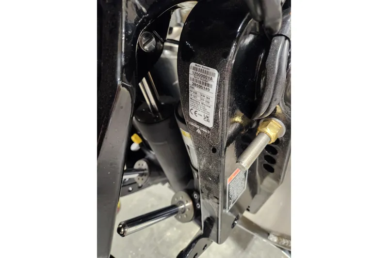 Slide: The Image of 2026 Tahoe Pontoon 25 Cascade Quad Lounge with Mercury engine, docked on a snowy day. - 20