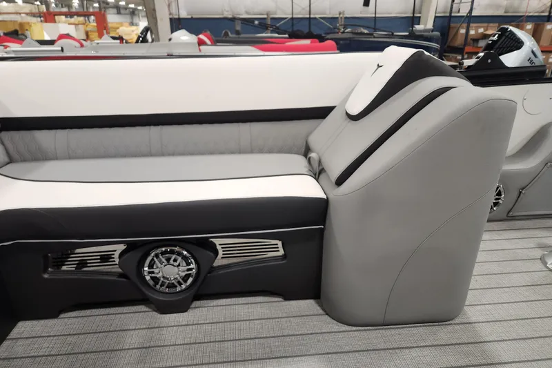 Slide: The Image of 2026 Tahoe Pontoon 25 Cascade Quad Lounge in a showroom, showcasing sleek design and modern features. - 33