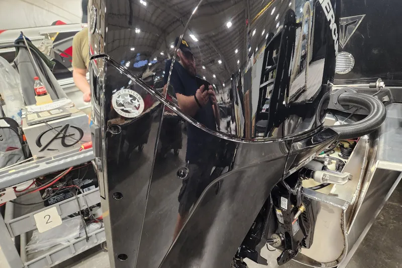 Slide: The Image of 2026 Tahoe Pontoon 25 Cascade Quad Lounge, sleek design, docked with modern features. - 6