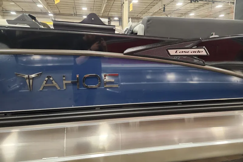 Slide: The Image of Dashboard of 2026 Tahoe Pontoon 25 Cascade Quad Lounge with modern controls and display. - 7