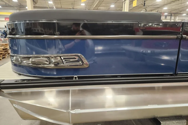 Slide: The Image of 2026 Tahoe Pontoon 25 Cascade Quad Lounge interior with stylish seating and modern design. - 8