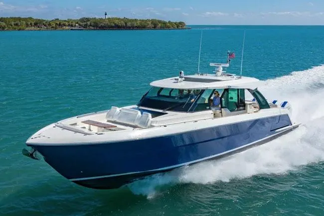 The Image of Manufacturer Provided Image: 2026 Tiara Yachts 56 LS cruising on blue ocean waters. - 0