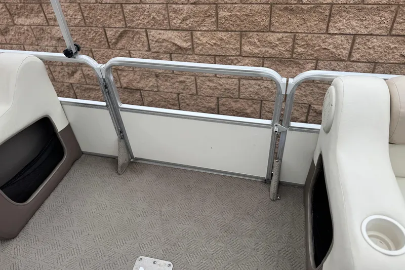 Slide: The Image of 2004 Sun Tracker Party Barge 21 interior with seating and railing detail. - 14