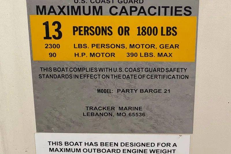 Slide: The Image of 2004 Sun Tracker Party Barge 21 capacity plate, 13 persons or 1800 lbs, U.S. Coast Guard compliant. - 22