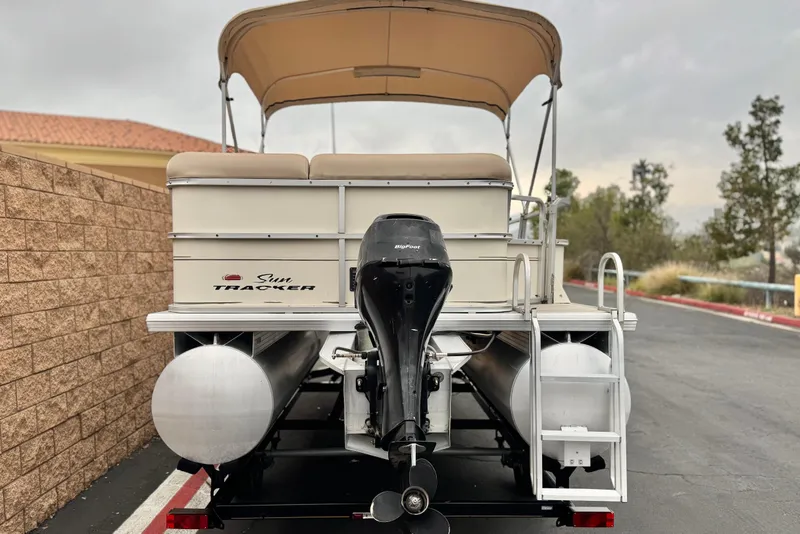 Slide: The Image of 2004 Sun Tracker Party Barge 21 pontoon boat with canopy and outboard motor. - 4