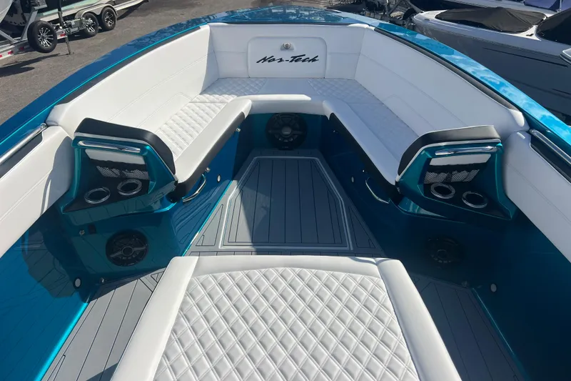 Slide: The Image of 2026 Nor-Tech 390 Sport Center Console with luxurious seating and modern design. - 18