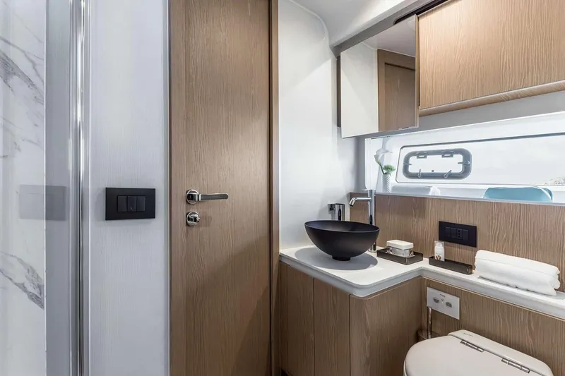 Slide: The Image of Manufacturer Provided Image: Luxurious bathroom interior of 2025 Azimut Fly 53 yacht with modern fixtures. - 12