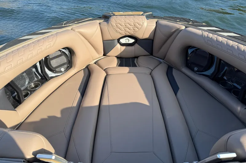 Slide: The Image of Luxurious interior of 2025 Centurion Ri245 boat with tan leather seating. - 13