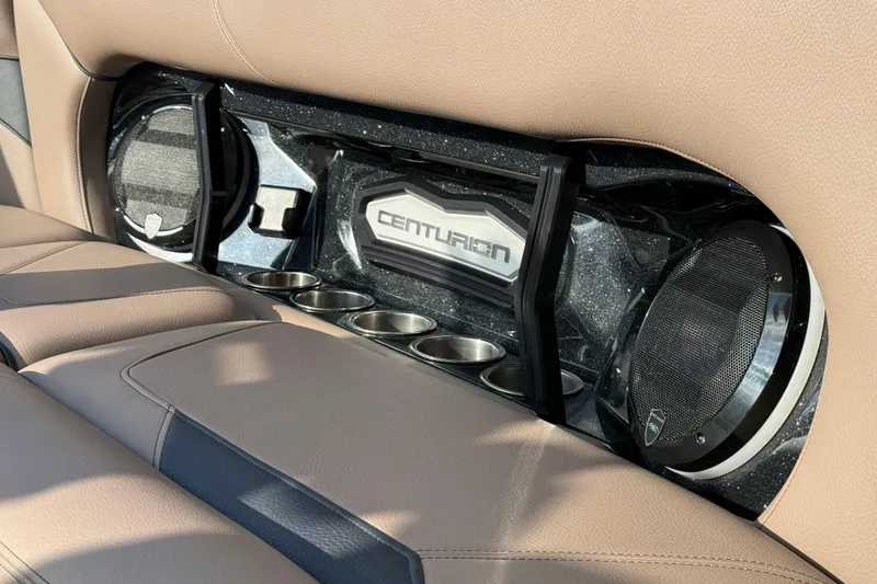 Slide: The Image of Interior of 2025 Centurion Ri245 with premium audio system and cup holders. - 16