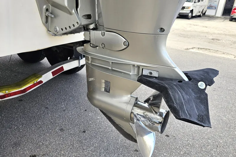 Slide: The Image of Close-up of a 2005 Hurricane FunDeck 218 RE OB boat motor and propeller. - 11