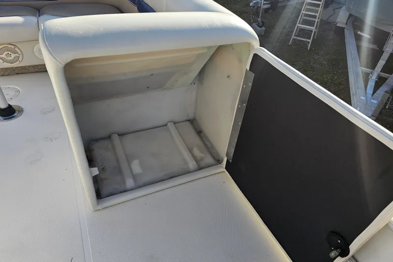 Slide: The Image of 2005 Hurricane FunDeck 218 RE OB boat interior storage compartment. - 24