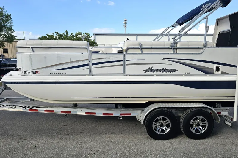 Slide: The Image of 2005 Hurricane FunDeck 218 RE OB boat on trailer, side view. - 3