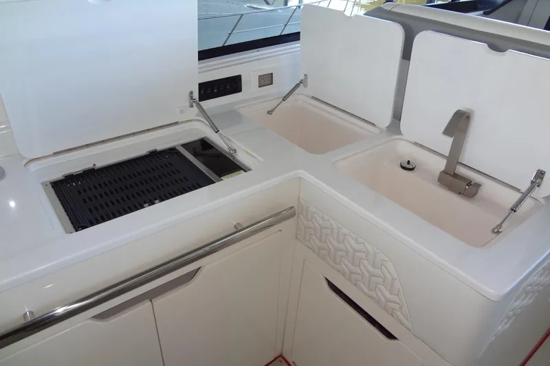 Slide: The Image of Luxury kitchen area on 2022 Regal LS36 yacht with sink and grill. - 10
