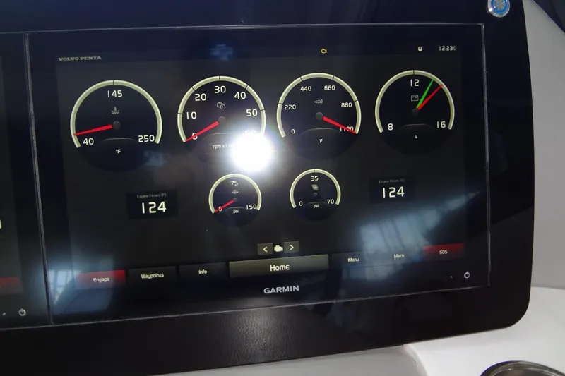 Slide: The Image of Dashboard display of 2022 Regal LS36 boat with various gauges and controls. - 18