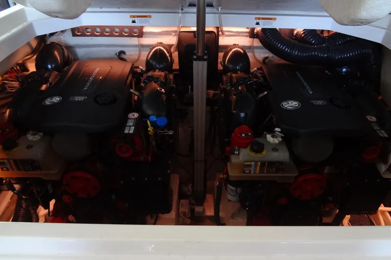 Slide: The Image of Engine compartment of 2022 Regal LS36 boat, showcasing dual powerful engines. - 35
