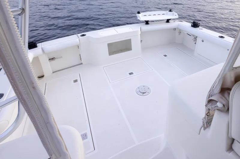 Slide: The Image of 2006 Cabo 40 Express boat deck with spacious seating and ocean view. - 36
