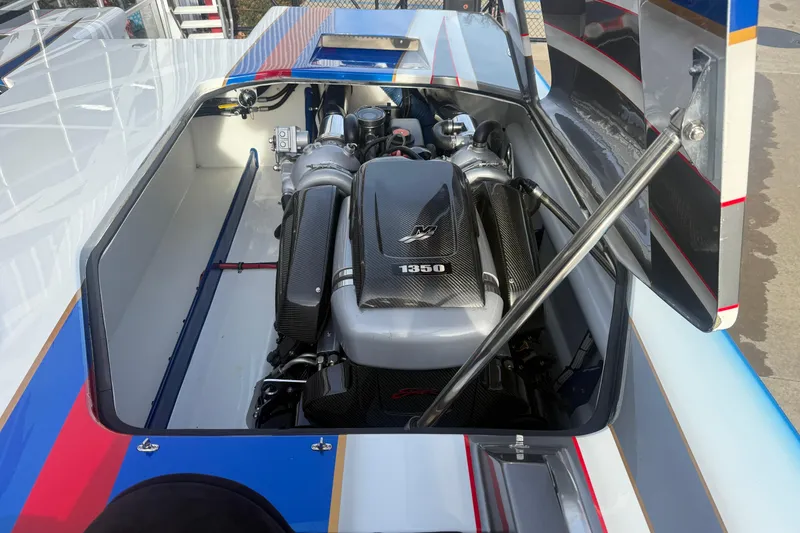 Slide: The Image of Engine compartment of 2016 Skater 388 boat with powerful 1350 engine. - 9
