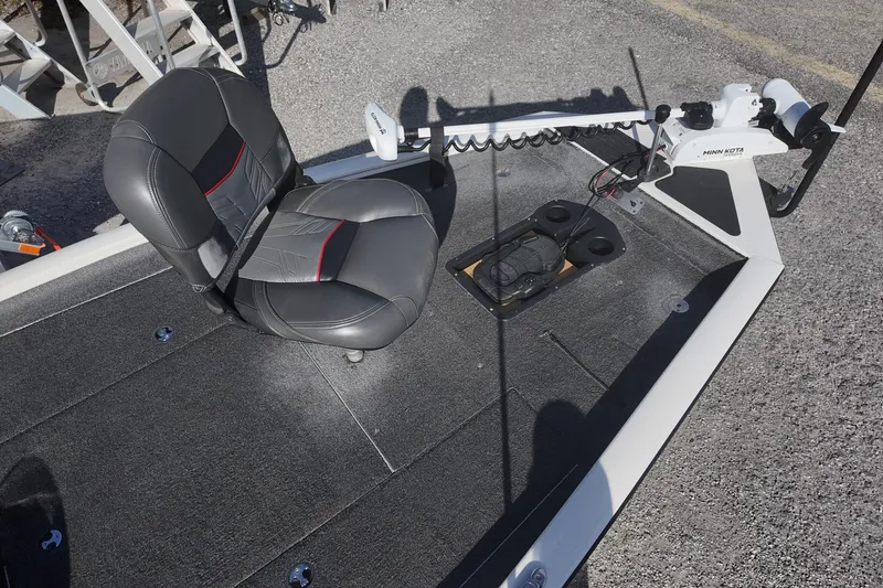 Slide: The Image of 2021 Tracker Pro Team 190 TX boat interior with seating and Minn Kota trolling motor. - 12