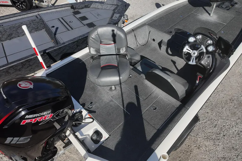 Slide: The Image of 2021 Tracker Pro Team 190 TX boat interior with Mercury Pro XS engine. - 5