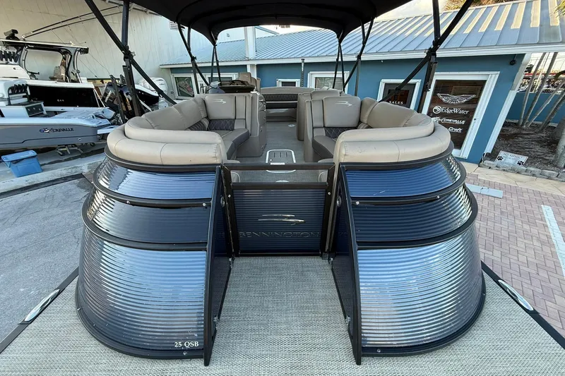 Slide: The Image of 2018 Bennington 25 QSB pontoon boat with spacious seating and sleek design. - 11
