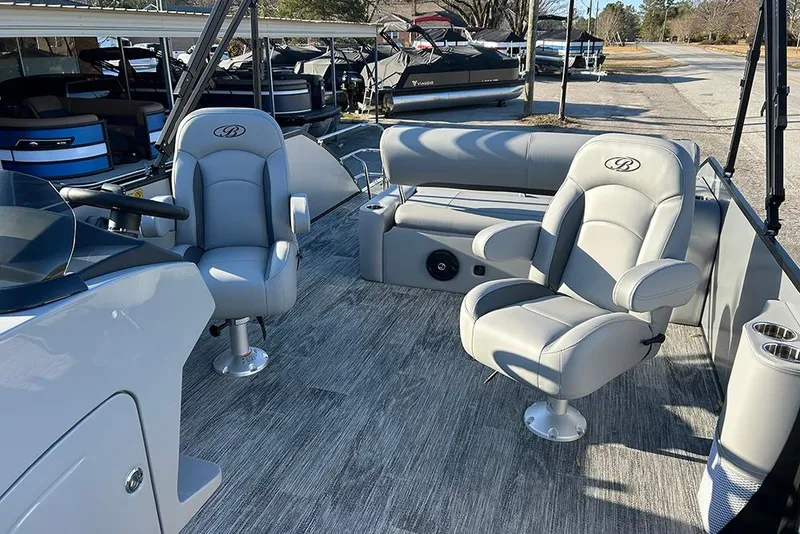 Slide: The Image of 2026 Bentley Pontoons Fish 243 Swingback interior with plush seating and modern design. - 10