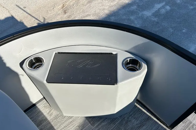 Slide: The Image of 2026 Bentley Pontoons Fish 243 Swingback console with cup holders and sleek design. - 21